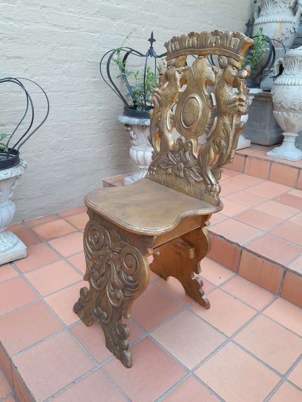 A 19th Century French Heavily Carved Oak Hand Gilded In Gold Leaf Statement Chair