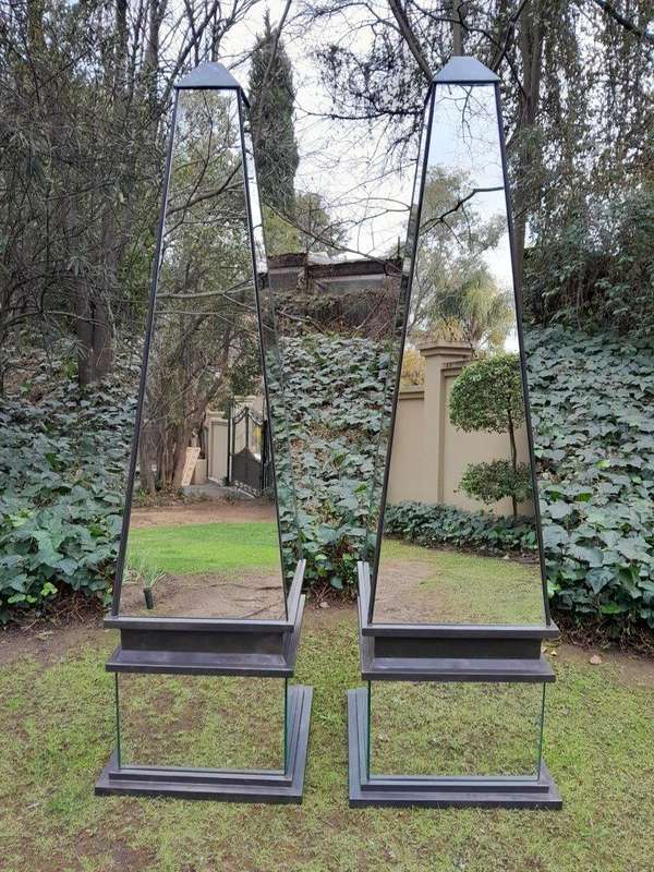 A Pair of Designer Mirror and Antique Coloured Iron Obelisks, Custom-made for The Crown Collection 