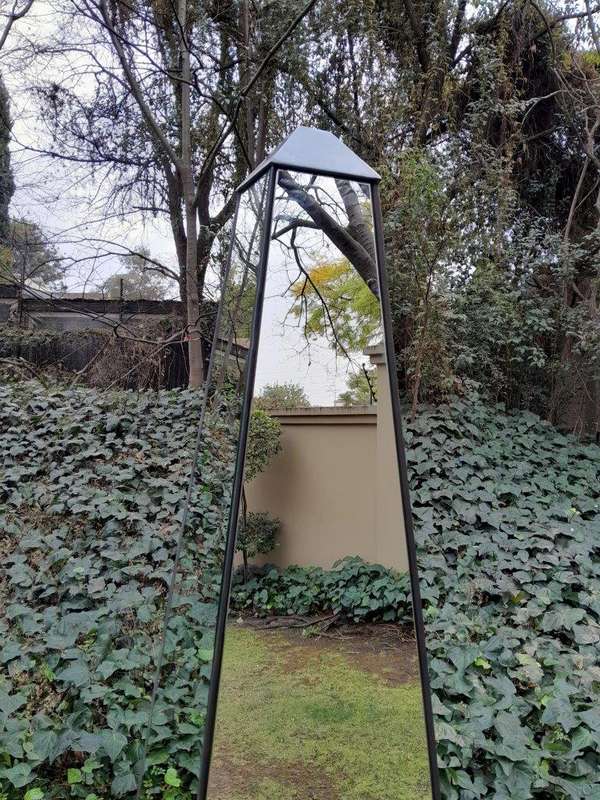 A Pair of Designer Mirror and Antique Coloured Iron Obelisks, Custom-made for The Crown Collection 