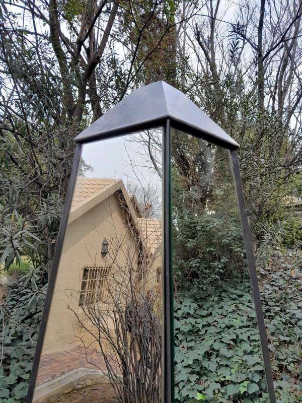 A Pair of Designer Mirror and Antique Coloured Iron Obelisks, Custom-made for The Crown Collection 