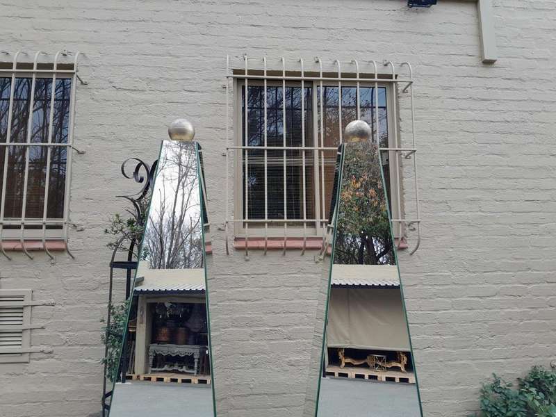 A Pair of Designer Mirror and Antique Gold Coloured Iron Ball and Detail Obelisks, Custom-made fo...