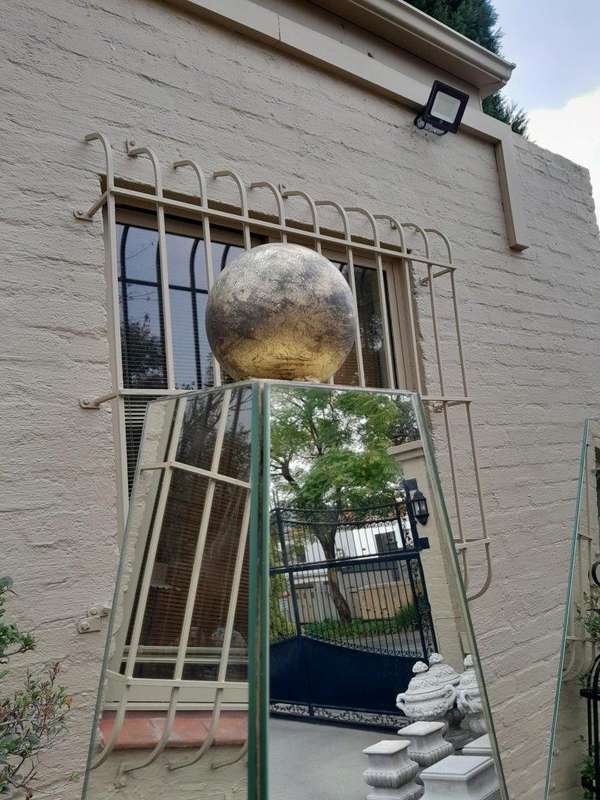 A Pair of Designer Mirror and Antique Gold Coloured Iron Obelisks with Ball Detail, Custom-made f...