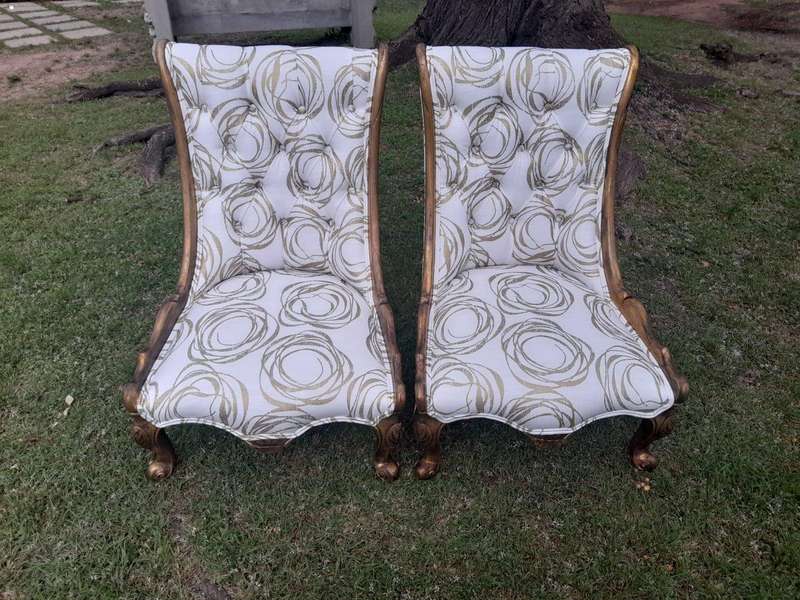 A 20th Century Pair of French Style Gilded Slipper Chairs Upholstered in a Custom Made Fabric