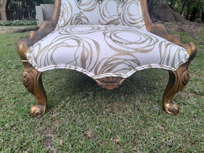 A 20th Century Pair of French Style Gilded Slipper Chairs Upholstered in a Custom Made Fabric