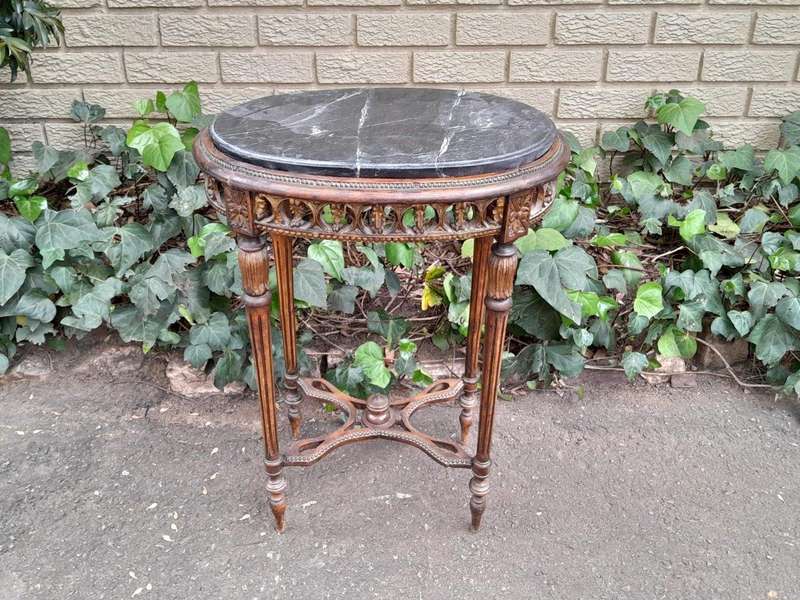 An Antique French Giltwood Table with Marble Top