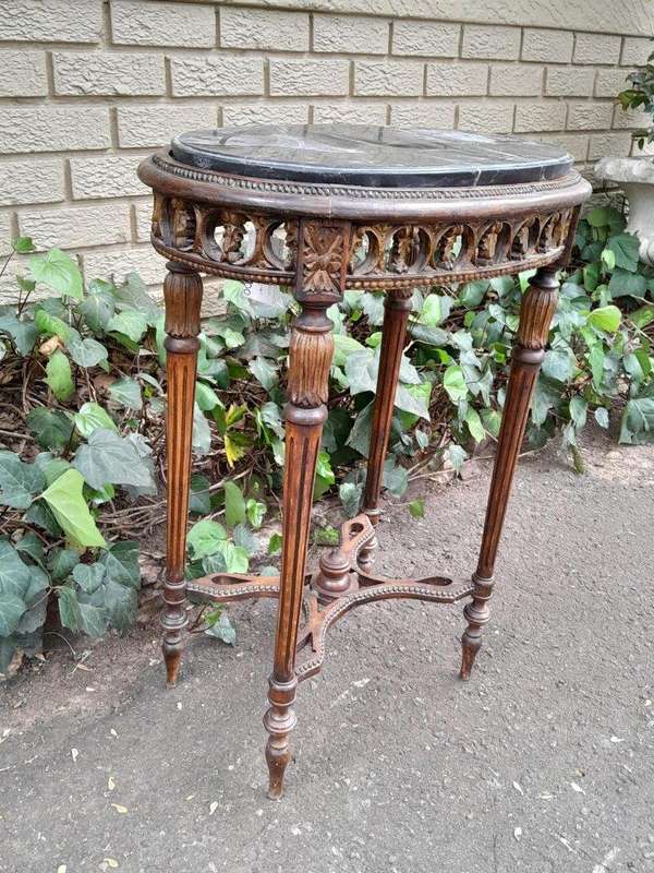 An Antique French Giltwood Table with Marble Top