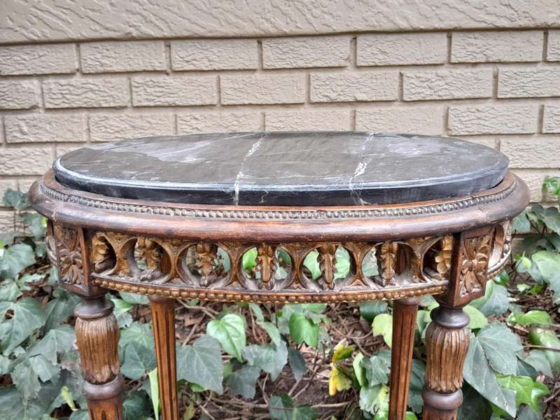 An Antique French Giltwood Table with Marble Top