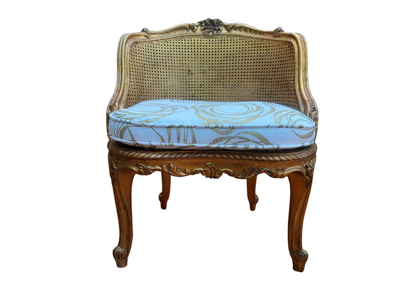 A 20th Century French Style Giltwood Rattan Chair Upholstered In Hand Printed Gold Design Fabric 
