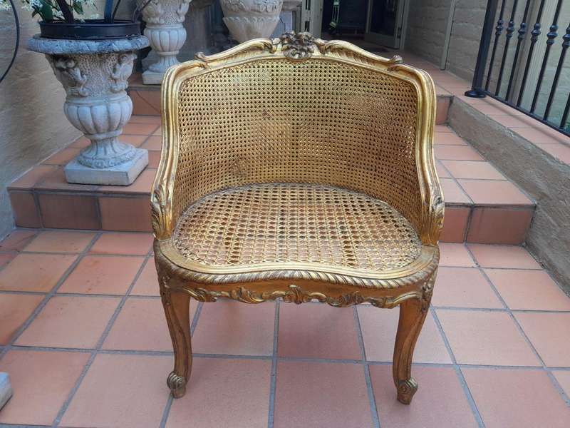 A 20th Century French Style Giltwood Rattan Chair Upholstered In Hand Printed Gold Design Fabric 