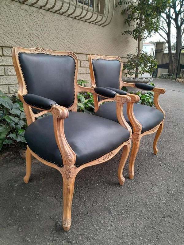 A 20th Century Pair of French Style Carved Fruitwood Armchairs in a Contemporary Bleached Finish ...