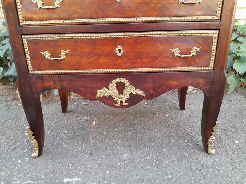 A 20th Century Parquetry Chest Of Drawers With Gilt Mounts And Marble Top