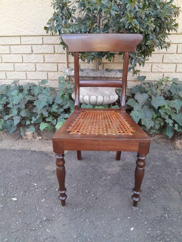 An Antique Set Of Six Cape Stinkwood Regency Chairs With Rattan Seats
