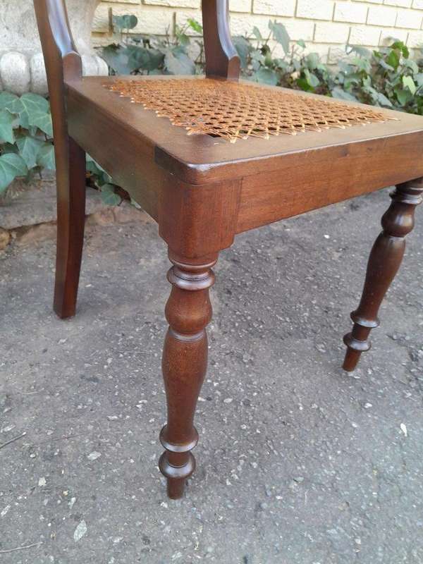 An Antique Set Of Six Cape Stinkwood Regency Chairs With Rattan Seats
