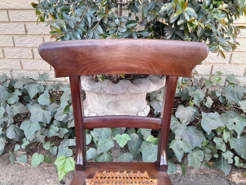 An Antique Set Of Six Cape Stinkwood Regency Chairs With Rattan Seats