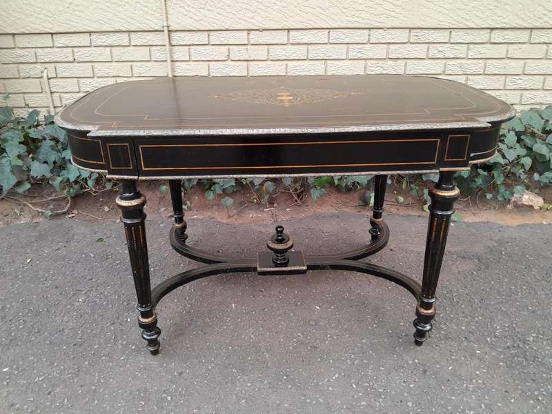 An Antique Victorian Ebonised and with Brass and Mother of Pearl Inlay Table with Drawer