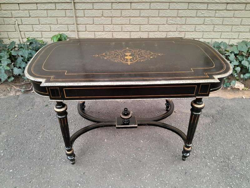 An Antique Victorian Ebonised and with Brass and Mother of Pearl Inlay Table with Drawer