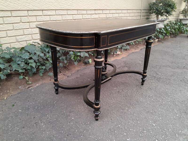 An Antique Victorian Ebonised and with Brass and Mother of Pearl Inlay Table with Drawer