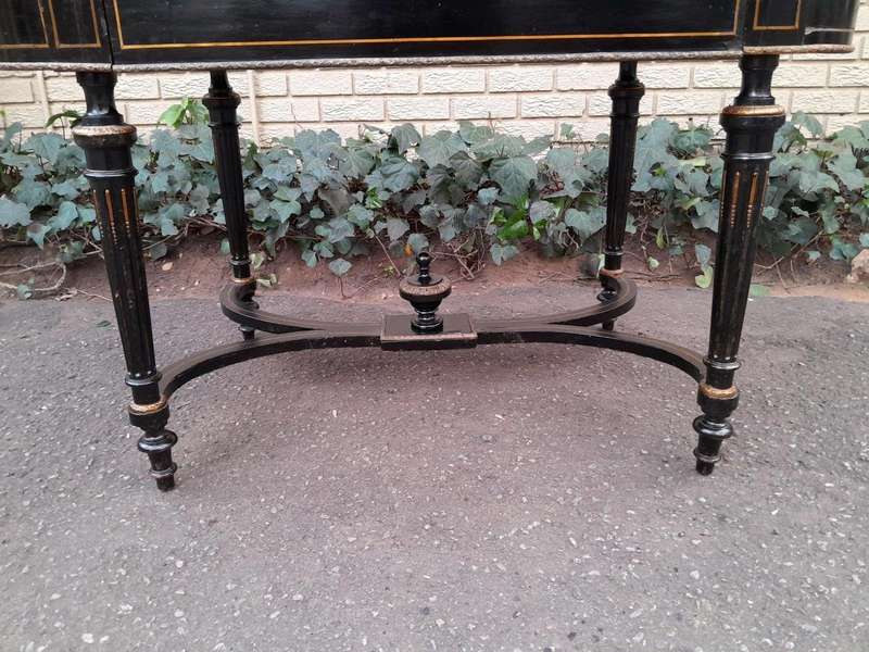 An Antique Victorian Ebonised and with Brass and Mother of Pearl Inlay Table with Drawer