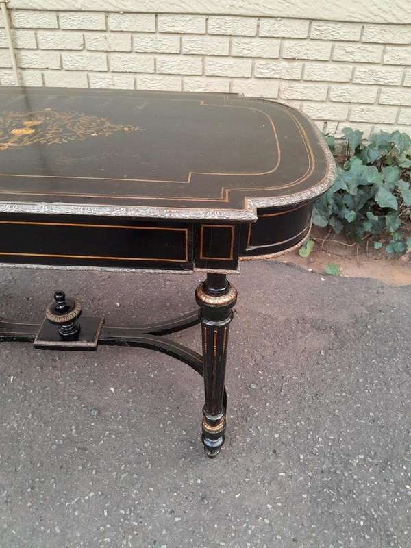 An Antique Victorian Ebonised and with Brass and Mother of Pearl Inlay Table with Drawer