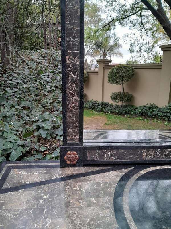 A 20TH Set of Century Maitland Smith Console Table and Mirror with Inlaid Stone Design