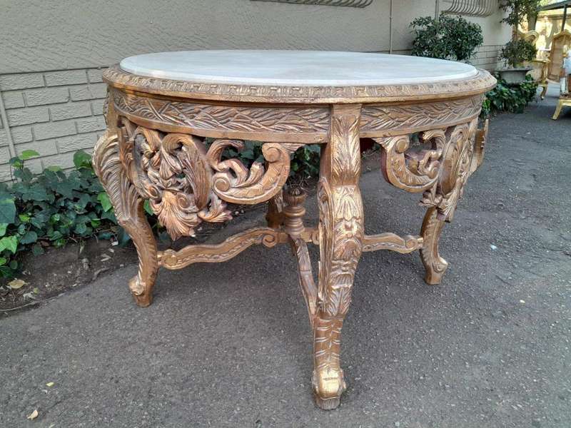 A 20th Century French Style Carved and Painted Coffee Table with Marble Top