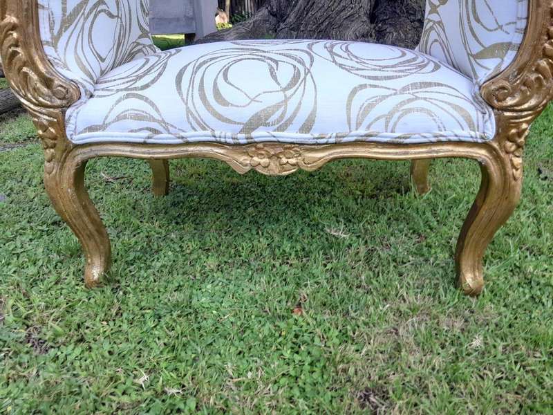 A French Style Ornately Carved Gold Painted Window Bench / Ottoman Upholstered In Hand Printed G...