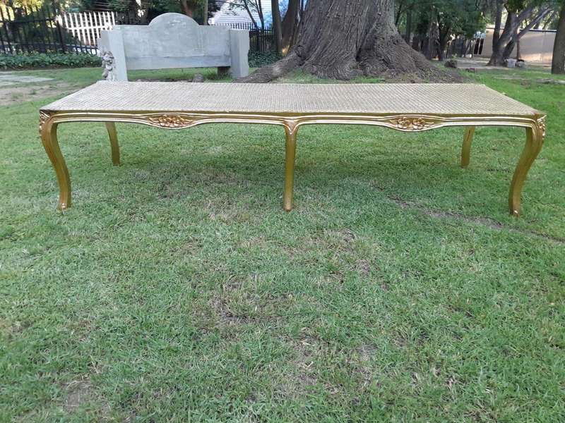 A 20th Century French Style Carved And Gilded Rattan Ottoman /  Bench With Seat Cushion In Hand M...