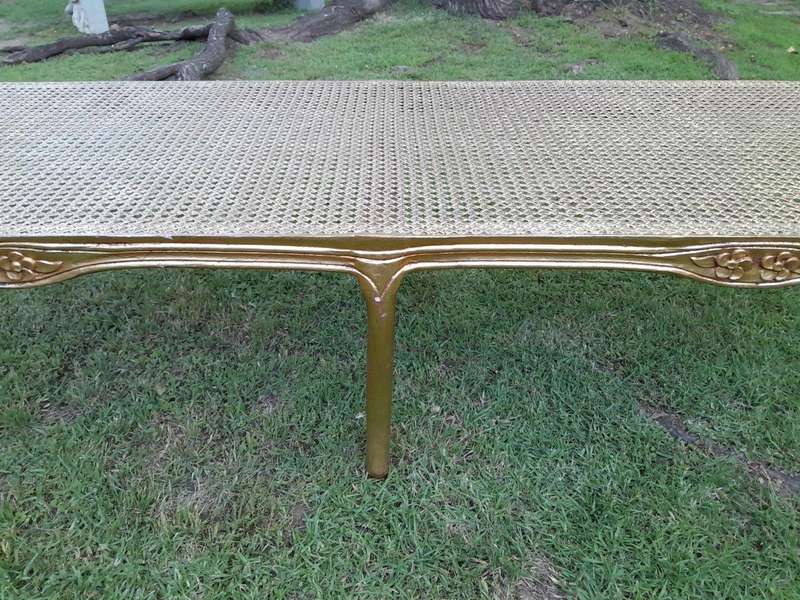 A 20th Century French Style Carved And Gilded Rattan Ottoman /  Bench With Seat Cushion In Hand M...