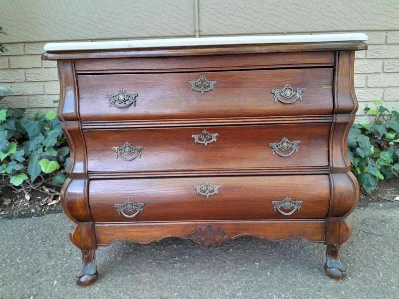 A 19th Century French Provincial Louis XVI-style Oakwood Bombe Chest of Drawers with Galala Cream...