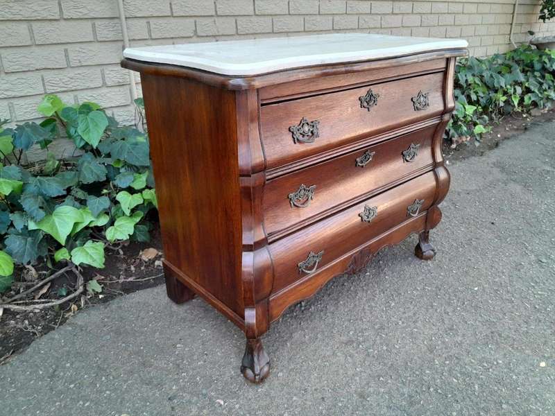A 19th Century French Provincial Louis XVI-style Oakwood Bombe Chest of Drawers with Galala Cream...