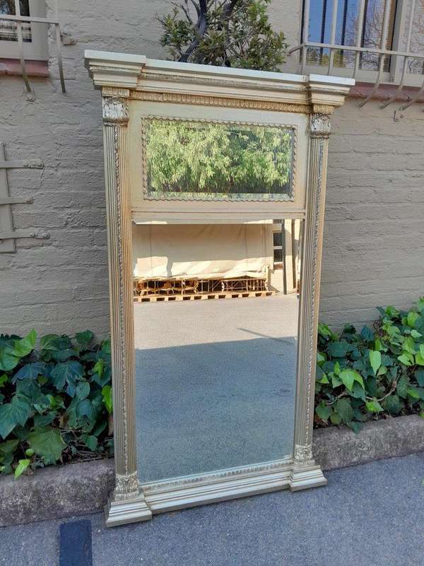 A 20th Century French Empire Style Hand Gilded with Gold Leaf Giltwood Pier Mirror