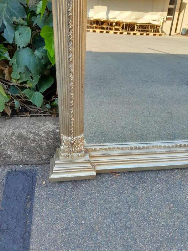 A 20th Century French Empire Style Hand Gilded with Gold Leaf Giltwood Pier Mirror