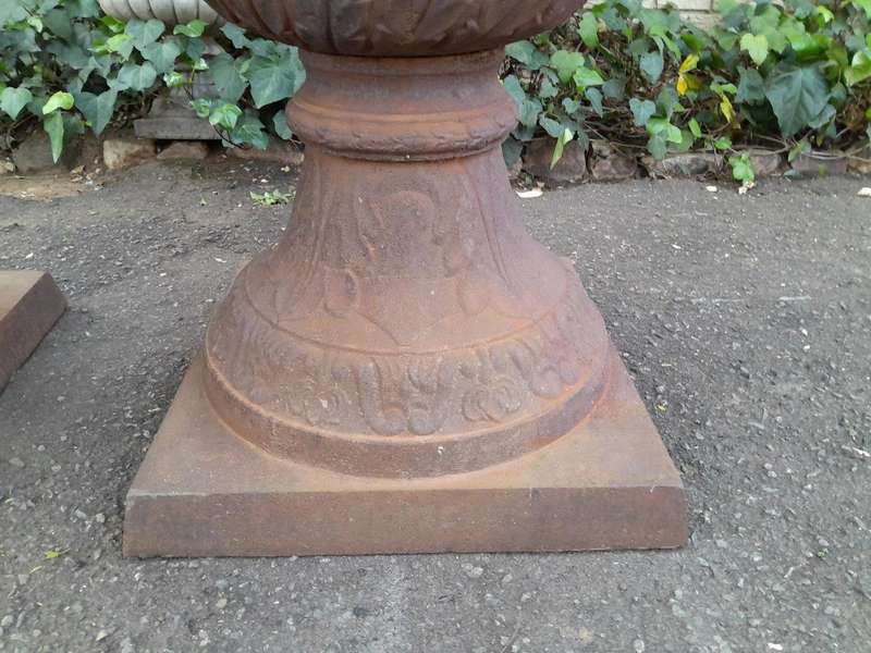 A Rare and Massive Extremely Heavy Pair of Cast Iron Urns with Tops