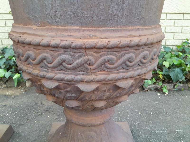 A Rare and Massive Extremely Heavy Pair of Cast Iron Urns with Tops