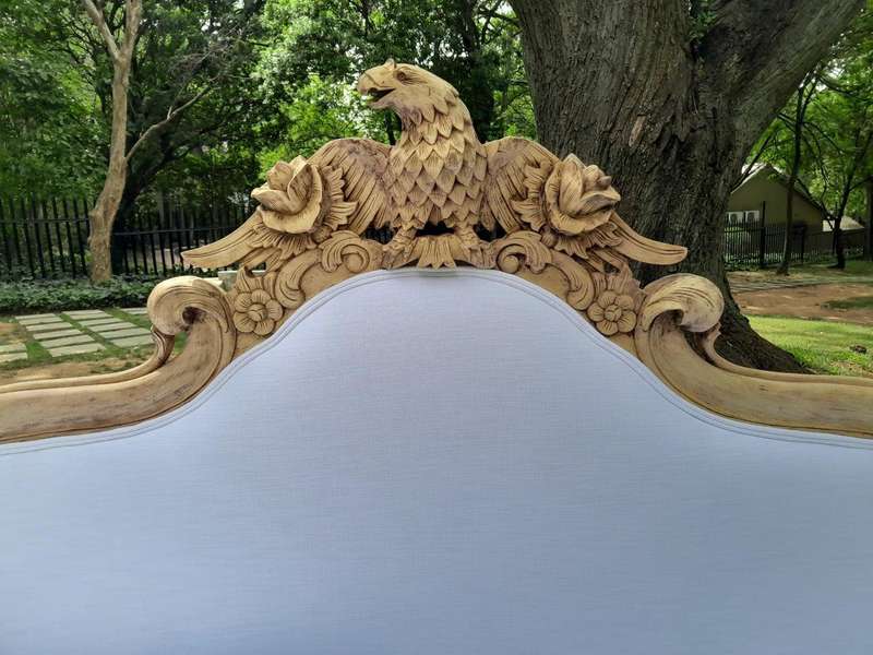A 20th Century Ornately  Carved Eagle Settee In A Bleached Contemporary Finish Upholstered In A ...