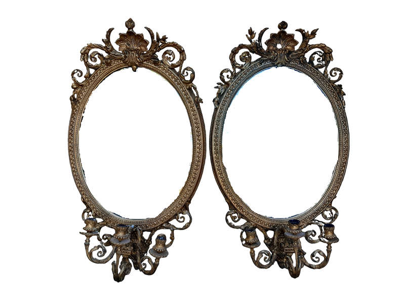 A Rare Pair of 19th Century Ornately Carved and Gilded Mirrors of Large Prroportion