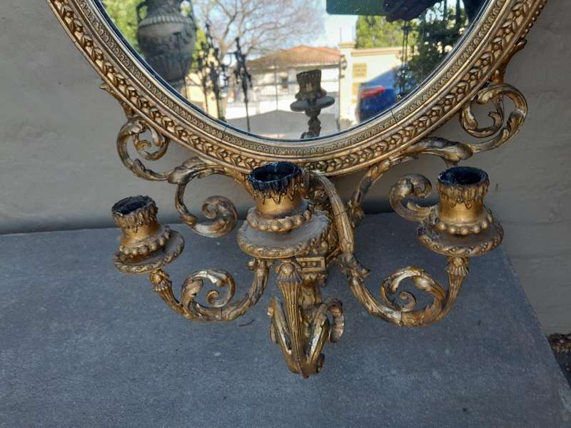 A Rare Pair of 19th Century Ornately Carved and Gilded Mirrors of Large Prroportion