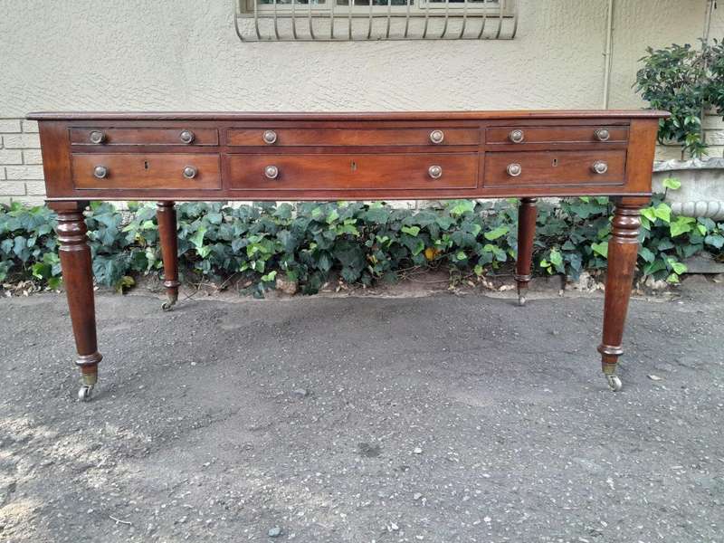An Antique Victorian Late 19th Century Mahogany Partners Writing Table with a Gilt Tooled Leather...