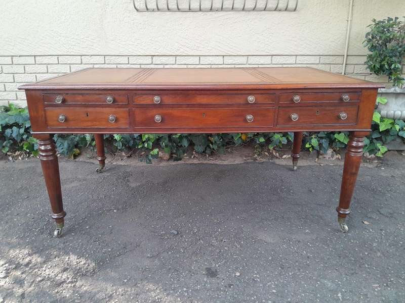 An Antique Victorian Late 19th Century Mahogany Partners Writing Table with a Gilt Tooled Leather...