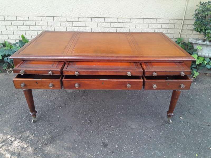 An Antique Victorian Late 19th Century Mahogany Partners Writing Table with a Gilt Tooled Leather...
