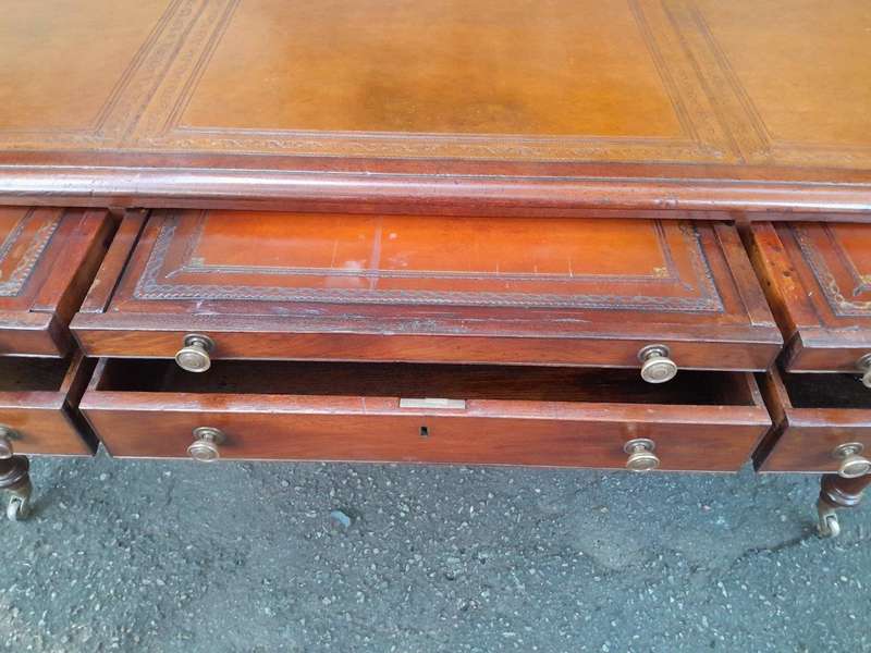 An Antique Victorian Late 19th Century Mahogany Partners Writing Table with a Gilt Tooled Leather...