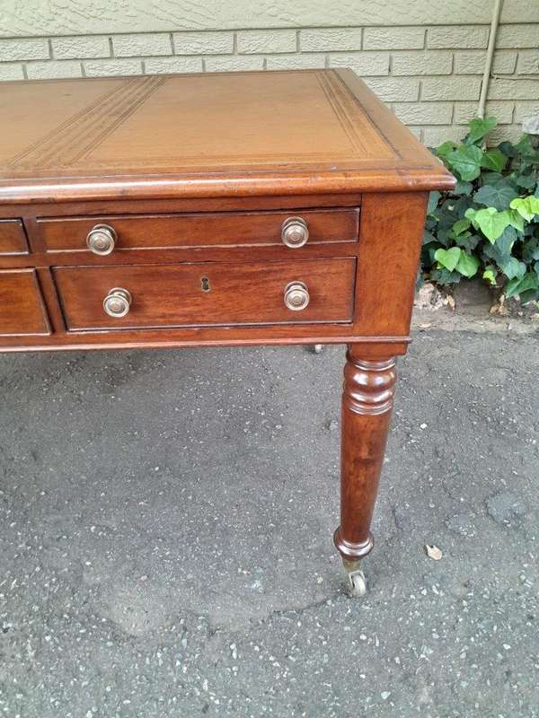 An Antique Victorian Late 19th Century Mahogany Partners Writing Table with a Gilt Tooled Leather...