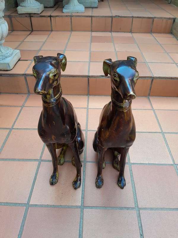 A 20th Century Pair of Life-Size Spelter and Patinated Greyhounds