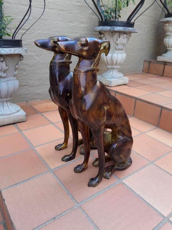 A 20th Century Pair of Life-Size Spelter and Patinated Greyhounds