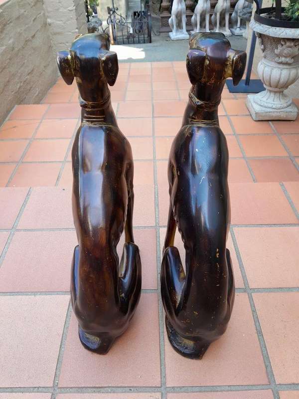 A 20th Century Pair of Life-Size Spelter and Patinated Greyhounds