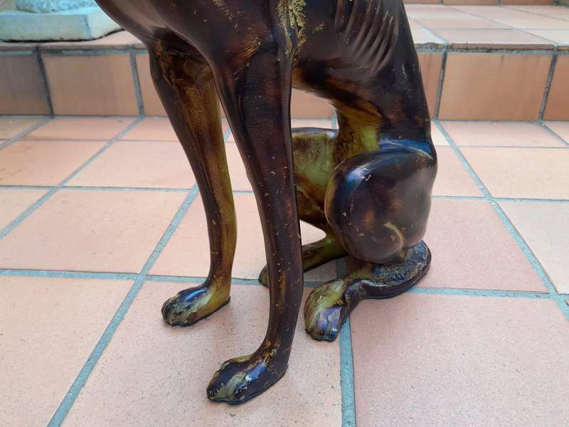 A 20th Century Pair of Life-Size Spelter and Patinated Greyhounds