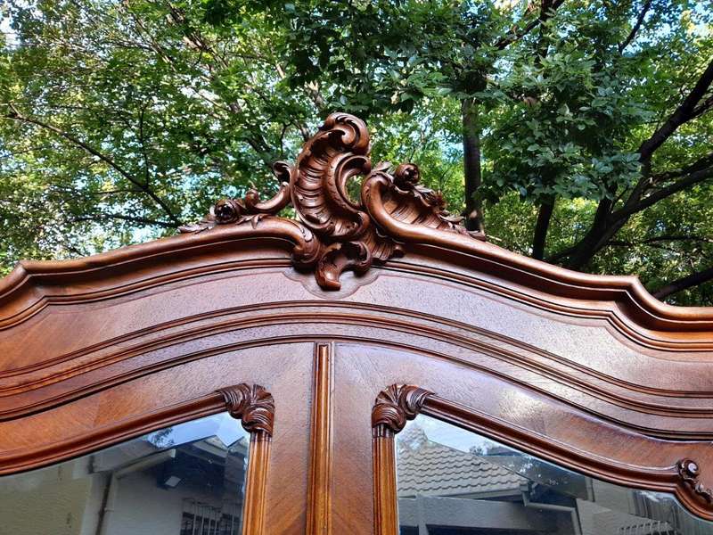 A 20th Century French Louis XV Style Walnut Armoire with Bevelled Mirrors