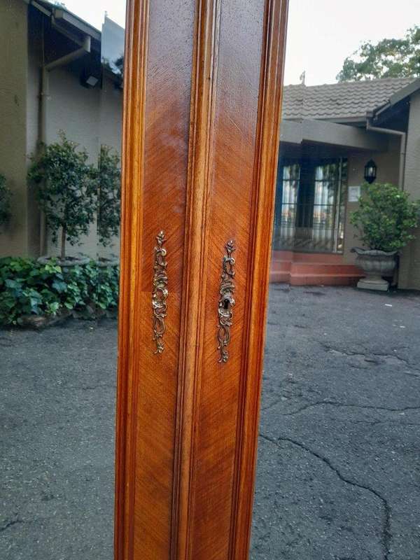 A 20th Century French Louis XV Style Walnut Armoire with Bevelled Mirrors