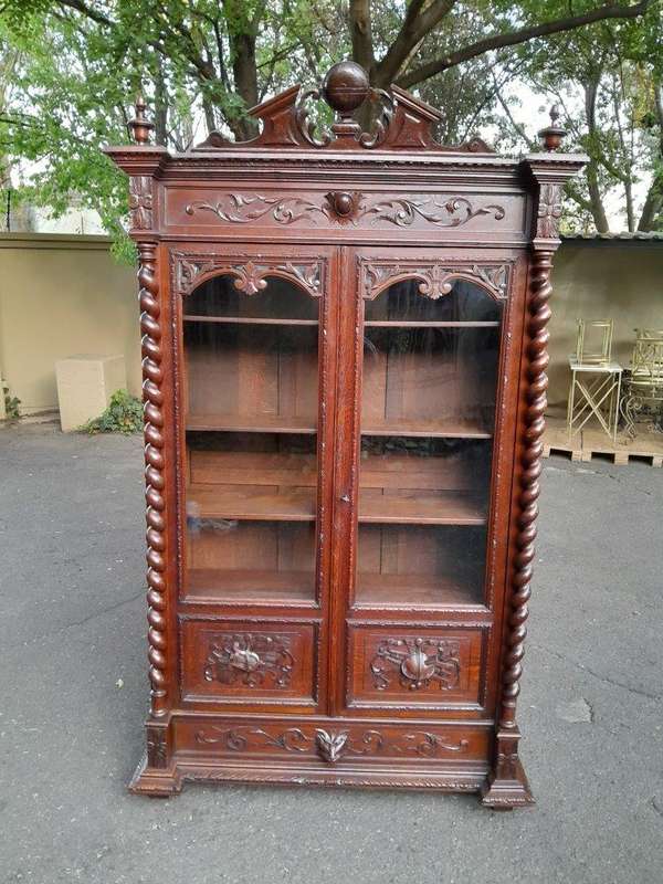 A 19th Century French Louis XVI- Style  Carved Oak Bookcase Cabinet with Glazed Doors