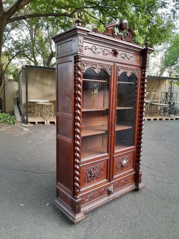 A 19th Century French Louis XVI- Style  Carved Oak Bookcase Cabinet with Glazed Doors